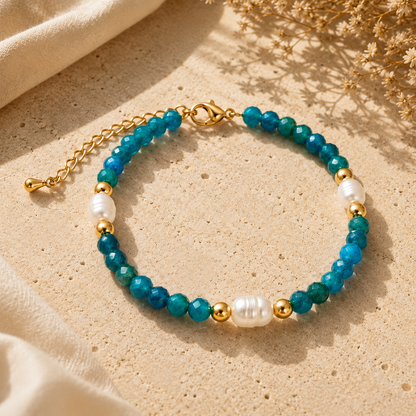 Armband mit türkisfarbenen und perlenartigen Perlen