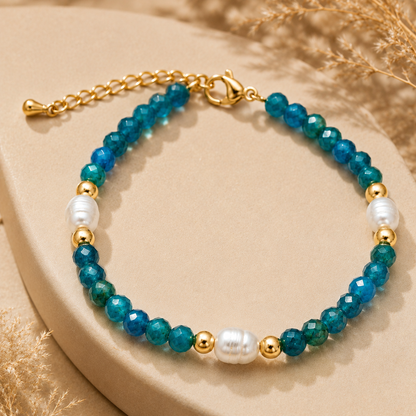 Armband mit türkisfarbenen und perlenartigen Perlen