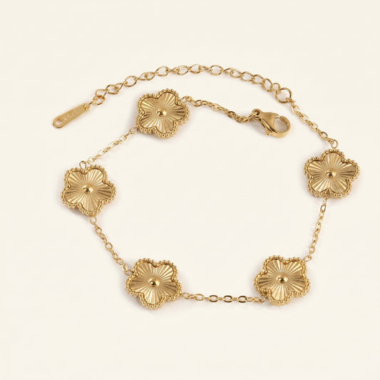 Goldenes Blütenarmband